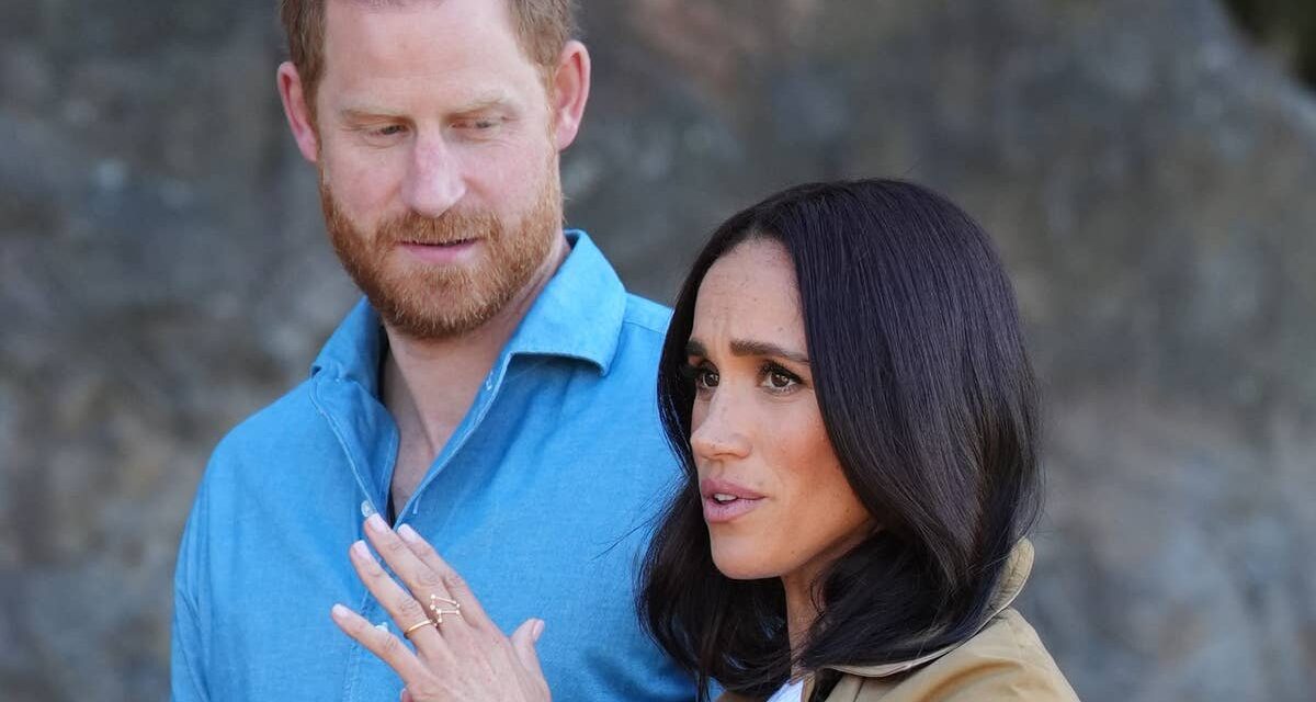 Le prince Harry et Meghan Markle partagent un doux baiser sur les lèvres dans un moment inédit de leur voyage en Australie
